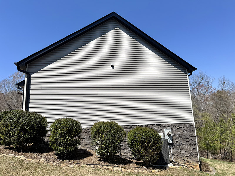 Home exterior with new vinyl siding
